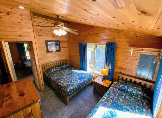 Bedroom with a queen and twin bed.