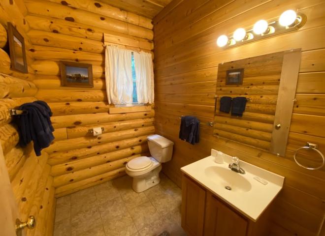 Main level half bathroom located near the entrance.