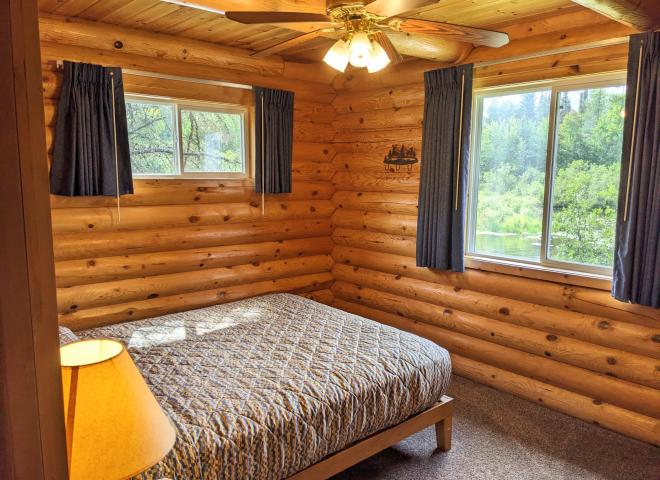 Main floor bedroom with a queen bed.