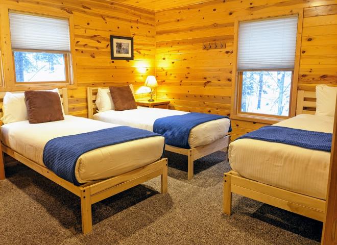 Master bedroom with two XL twins, one regular twin, and an ensuite bathroom.