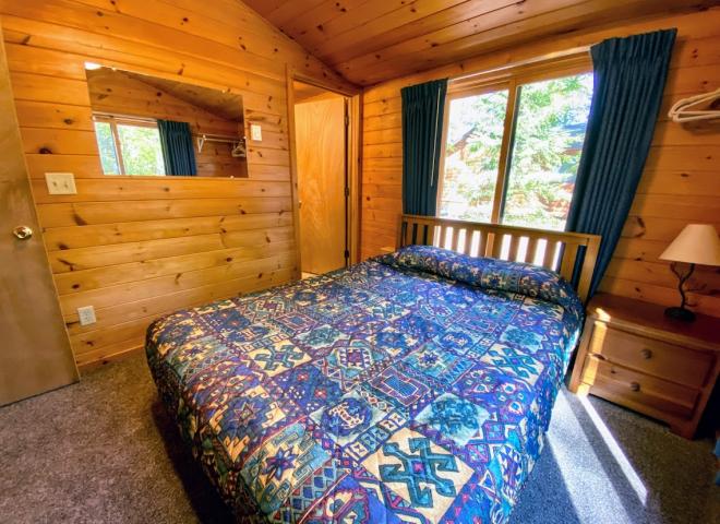 Master bedroom with queen size bed and ensuite bathroom.