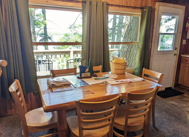 Dining room with seating for 6 and views of the lake.