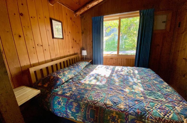 Bedroom with a queen bed.