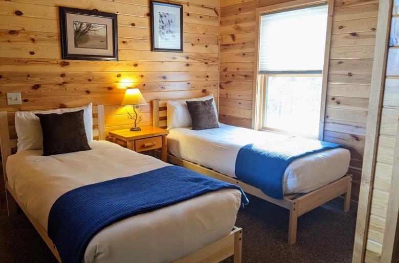 Upstairs bedroom with two XL twin beds.
