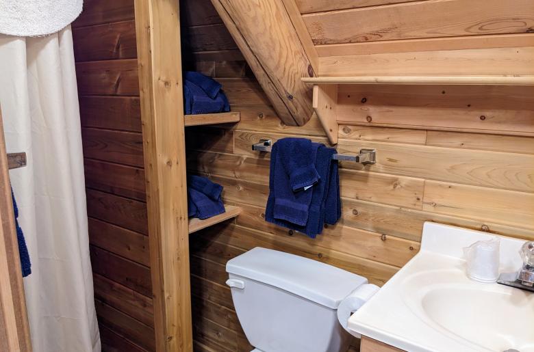 Loft bathroom with a shower stall.