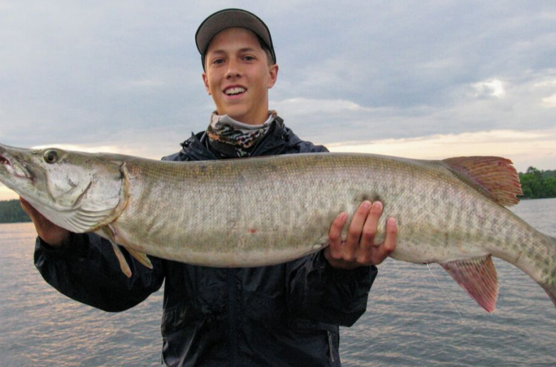 Man holding a muskie