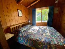 Bedroom with a queen bed.